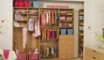 A picture of a Tailored Living children's closet